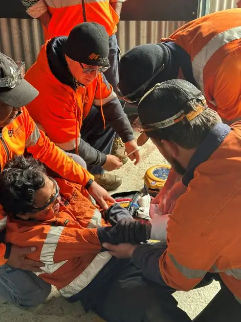 Simulated casualty with moulage injuries during a drill